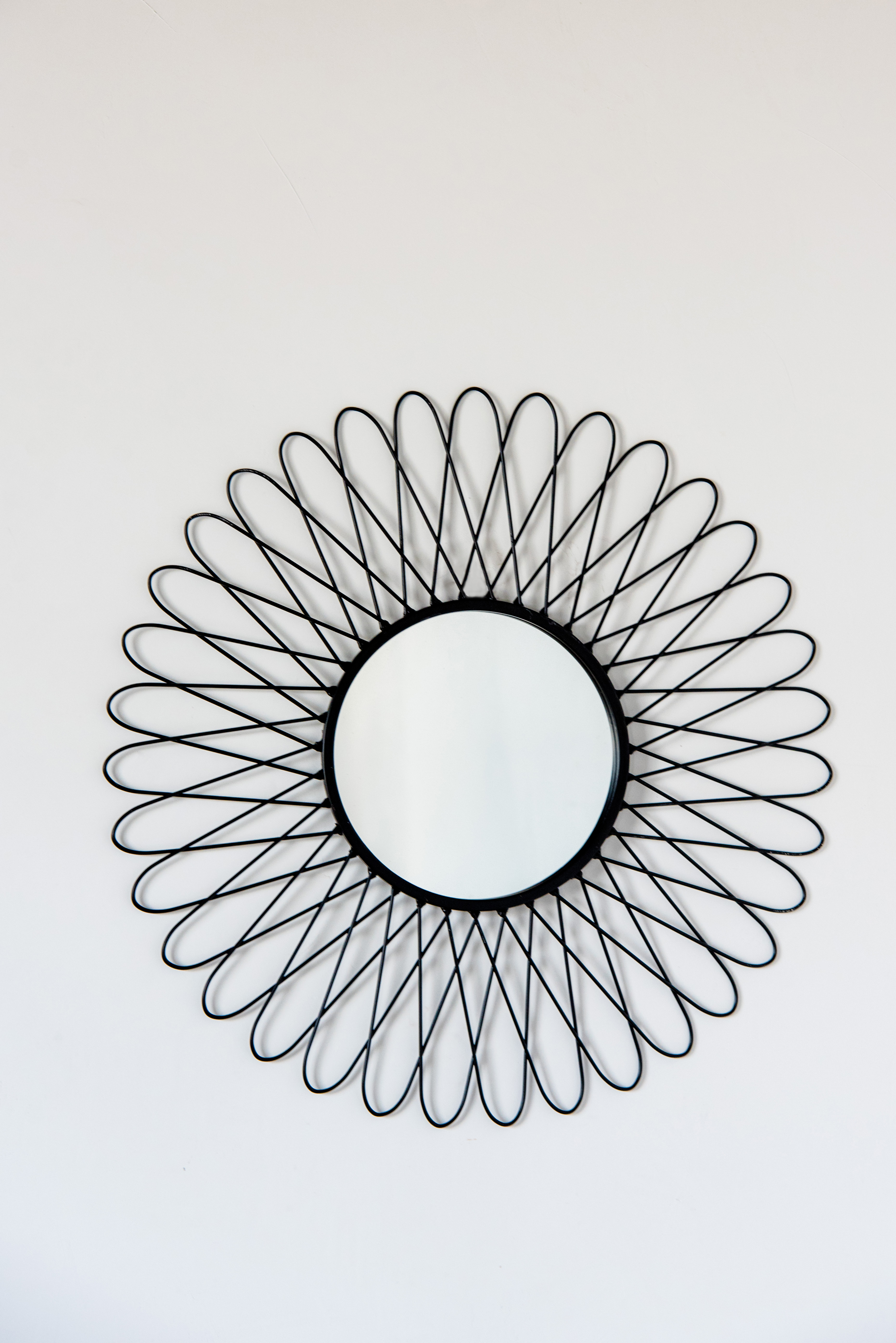 Miroir mural en métal